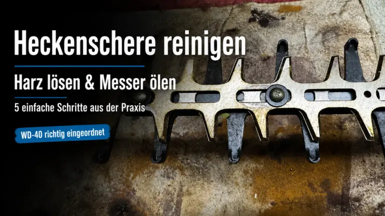 Heckenschere reinigen: verschmutztes Messer mit Harz und Pflanzenrückständen